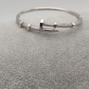 Silver Tone Pavé Nail Bracelet | Zircon Accents | Sleek Modern Statement Jewelry